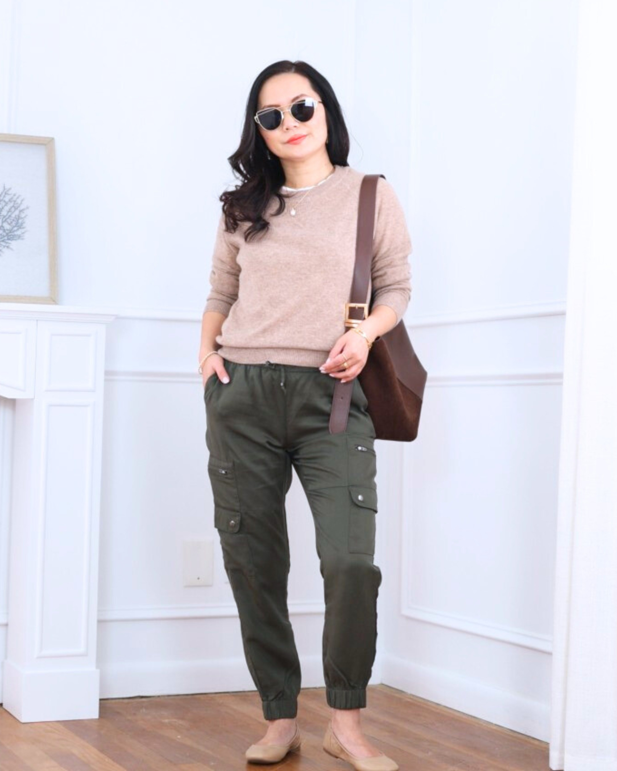 Casual with a chic twist — a shrunken sweater from Quince paired with Banana Republic Factory cargo joggers and Amazon ballet flats. Comfortable, relaxed, and still feels thoughtfully styled for everyday wear. I’m 5’2, wearing size XS.

#LTKOver40 #LTKPetite #LTKootd