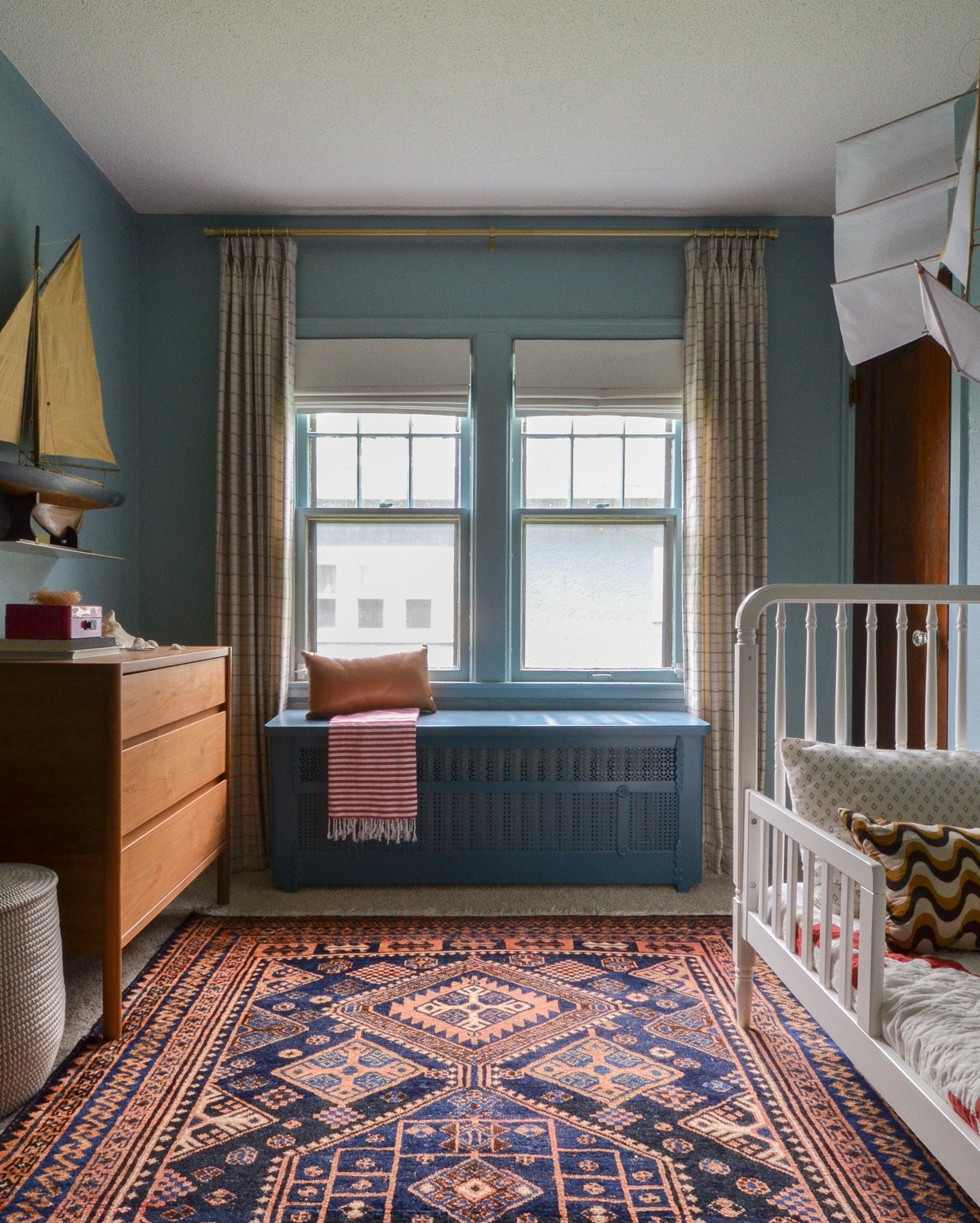 Stills of Leo’s room that I completely forgot I’d taken! 😄 I’ll forever love this blue hue we picked for his walls and trim though. It instantly wraps you up in a hug when you enter. 🤗  All sources are tagged in stories and through LTK. Radiator cover, rug and sailboat are vintage finds. 

Walls & Trim Paint: HGTV Home by Sherwin Williams, Interesting Aqua.

#LTKKids #LTKHome