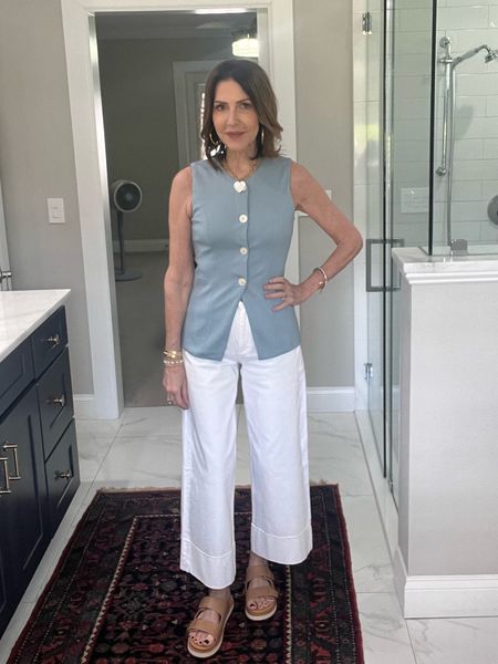 Sharing my ootd that I am loving. This vest is such great quality and only $39. I do recommend to size up one size. Paired with these white rag & bond jeans and neutral sandals

OGL vest, affordable vest, white denim outfit



#LTKOver40 #LTKStyleTip #LTKFindsUnder50