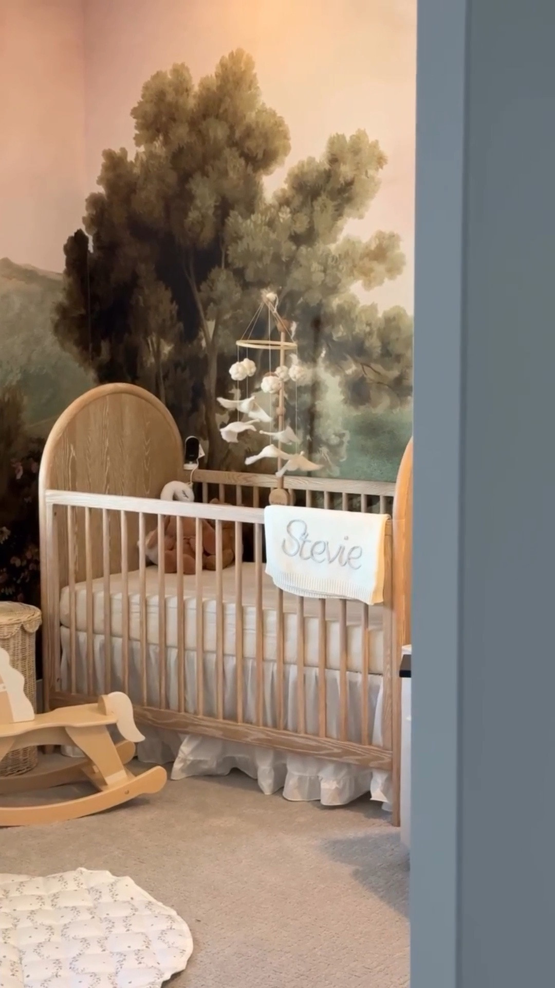 the official nursery reveal !!!! 🌳🌸 absolutely loved this project with @belartestudio — one we’ll never forget & hopefully she loves as she grows into it more! #firsttimemom #girlmom #nurseryinspo #nurserydecor #nurserywallpaper