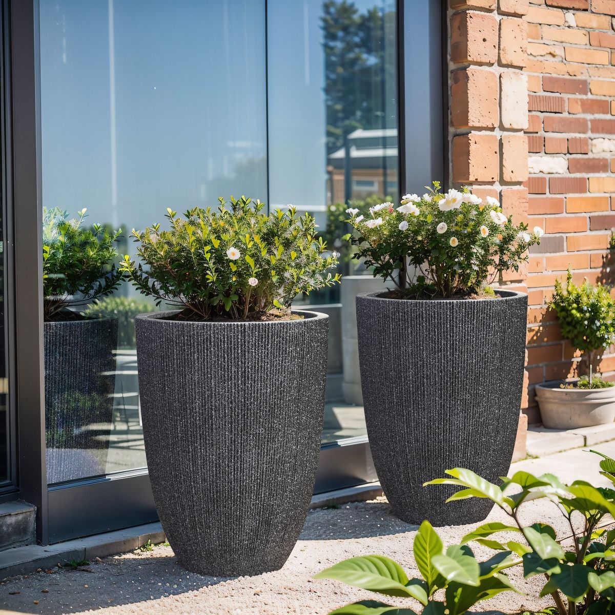 LuxenHome 2-Piece Tall Tapered Round Plastic Planters Set, Mediterranean Black | Target