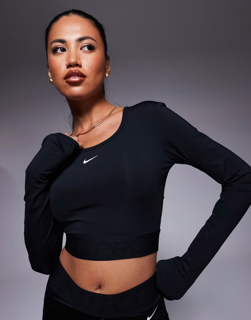 Nike Pro Training Dri-FIT cropped long sleeve top in black | ASOS (Global)
