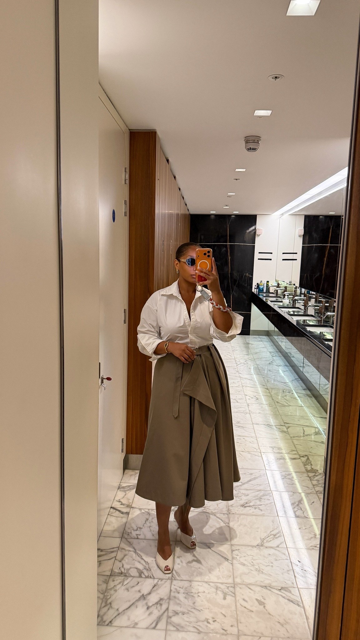 Classic white shirt + flowy olive skirt = one of my favourite office combos

#LTKmodest #LTKworkwear #LTKsummer