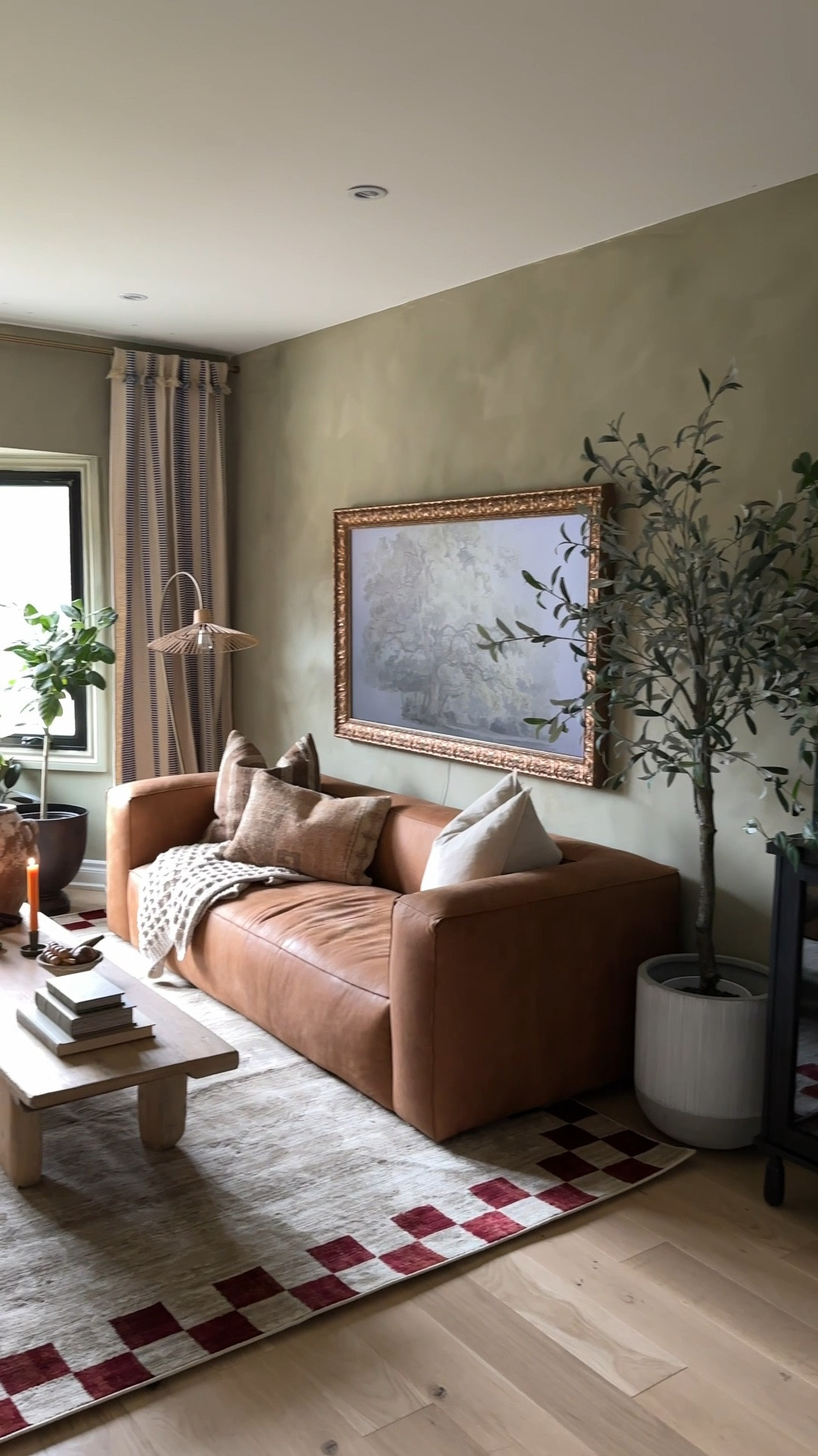 Our living room makeover is done and we added a lot of colour and moodiness in here. 

We added some curtains, a rug with a fun checked border and changed up the style just a little bit to keep things fresh. 

Linking our frame tv, our rug, the bar cabinet and more here

#LTKhome #LTKVideo