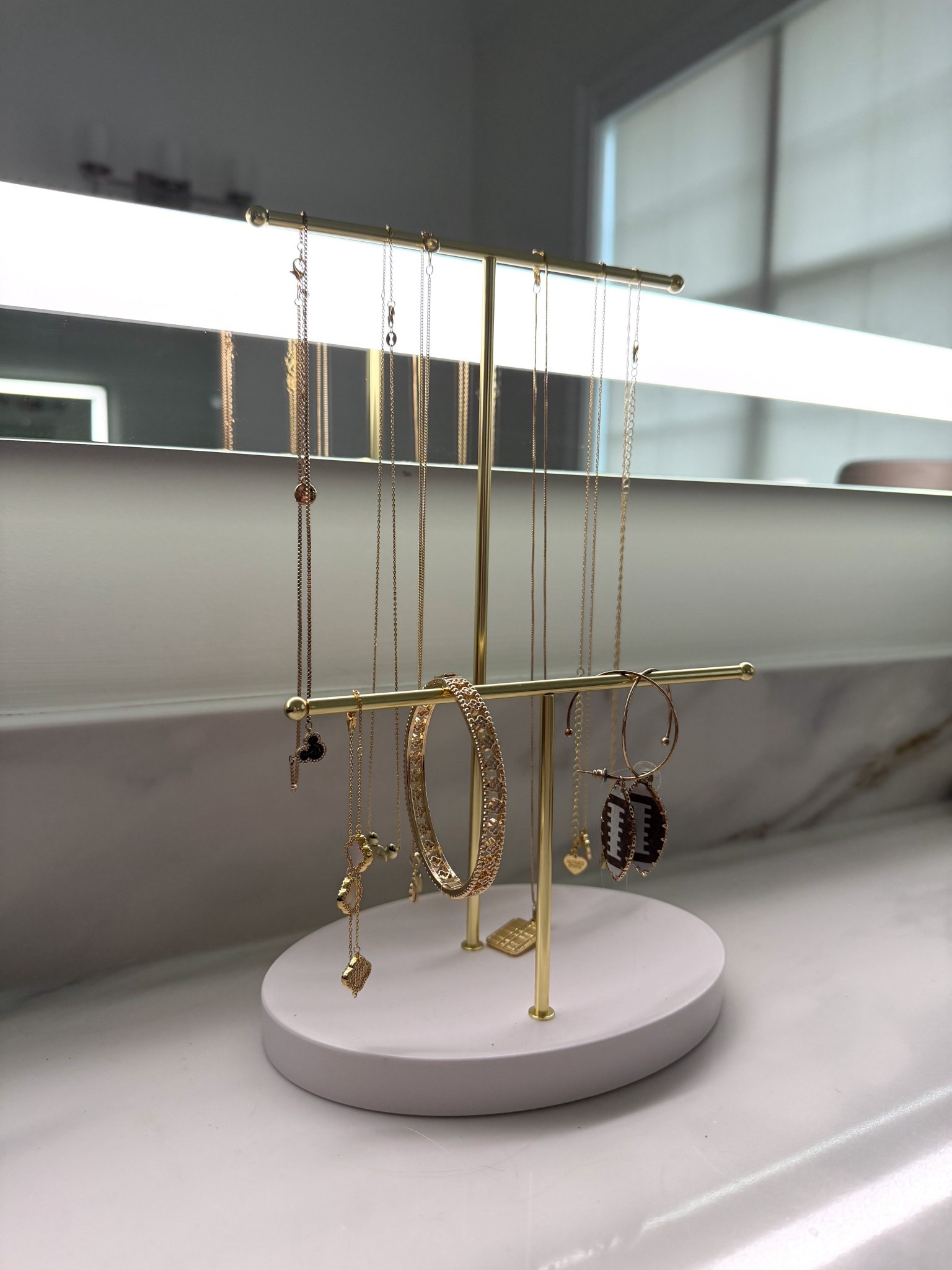 Loving this jewelry organizer for my necklaces! I grabbed it from target so I could have somewhere to put my recently worn pieces without them getting tangled! 

#LTKHome #LTKmorningroutine