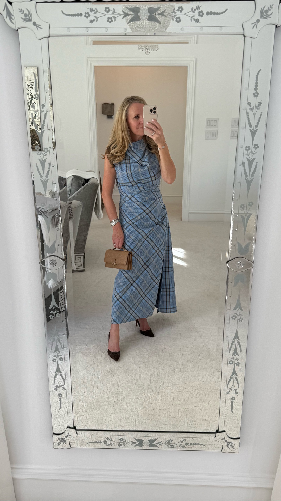 Beautiful sky, blue and chocolate brown plaid asymmetrical dress from Simkhai

I sized up one for room in the bus on 5’2” tall and typically wear a 0/2 or XS

Paired it with chocolate brown heels and nude color 
Miss Dior handbag 



#LTKOver40 #LTKSeasonal #LTKootd