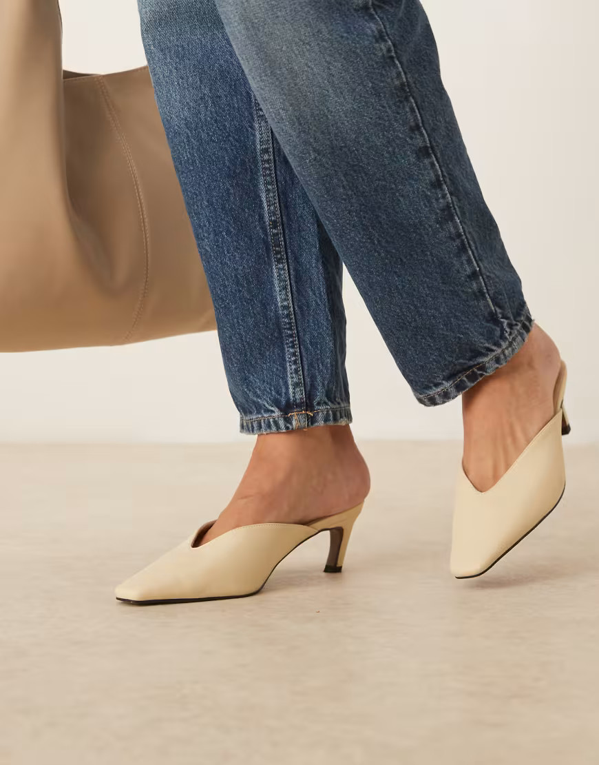 ASOS DESIGN Storm chisel toe mid heel mules in buttermilk-Yellow | ASOS (Global)