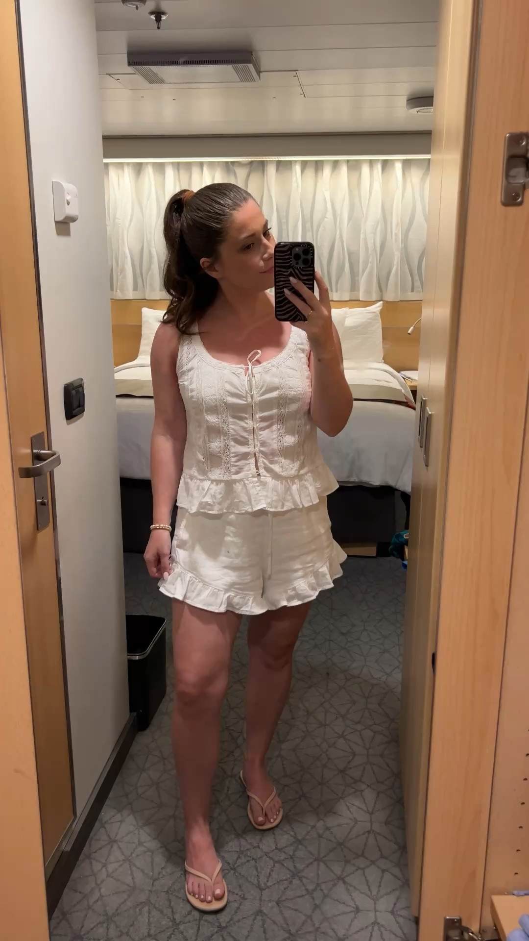 What I Wore on a Caribbean Cruise 🌊🌴☀️ wearing size Small both top and Ruffle shorts.  

#LTKdayinmylife #LTKPetite #LTKootd