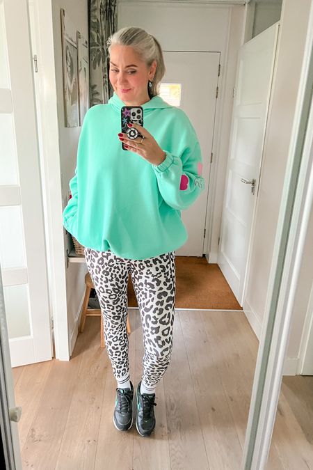 Ootd - I felt a bit off so went for a super oversized Reinders hoodie paired with black and white leopard print leggings with phone pockets. Leggings are old and unfortunately sold out but I linked similar. I am wearing a large. Crew socks and Nike Air Max sneakers. 



#LTKmidsize #LTKover40 #LTKeurope