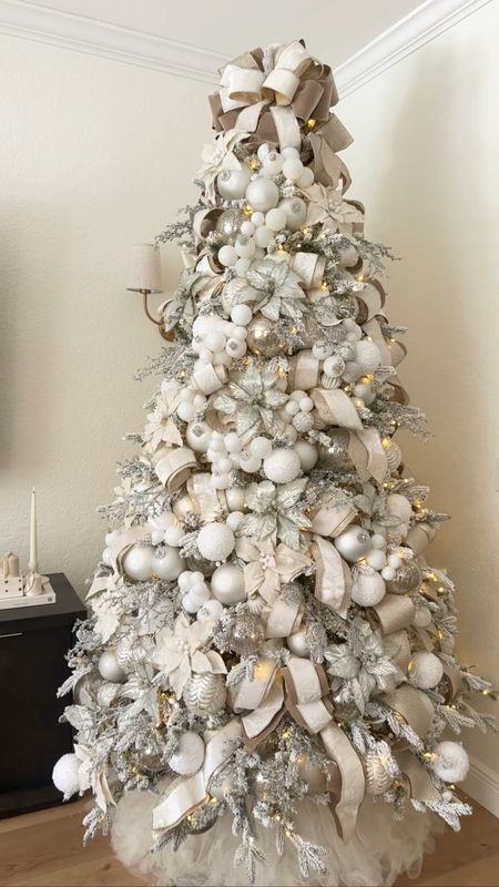 Beautiful white Christmas tree! 🥹✨♥️ 

Enjoy free shipping in ribbons and tree picks! #kingofchristmas #christmasdecor #christmastree

#LTKHoliday #LTKVideo