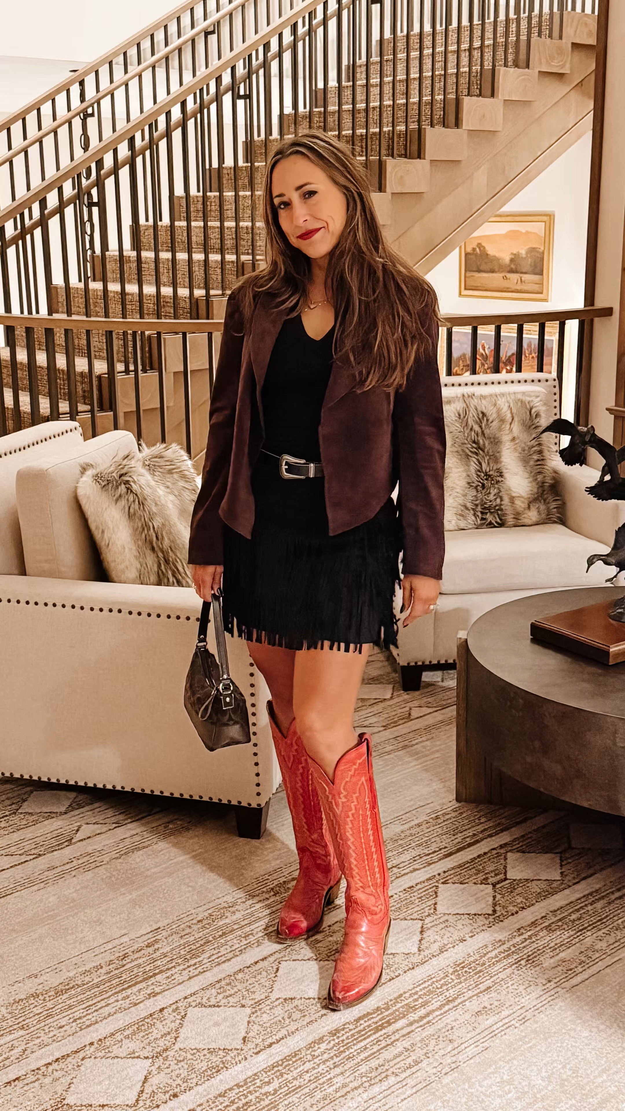 Limited to sharing 16 products.  Leave me a comment if you can’t locate an outfit. Linking a few here. 
Black fringe skirt
Black v neck long sleeve
Fringe brown suede jacket 
Lunchesse boots
Red boots outfit 

Western. 
Country 
Boots and skirt 
Brown suede jacket 
Pop of red
Country concert 
Rodeo 

#LTKTravel #LTKFindsUnder50 #LTKOver40