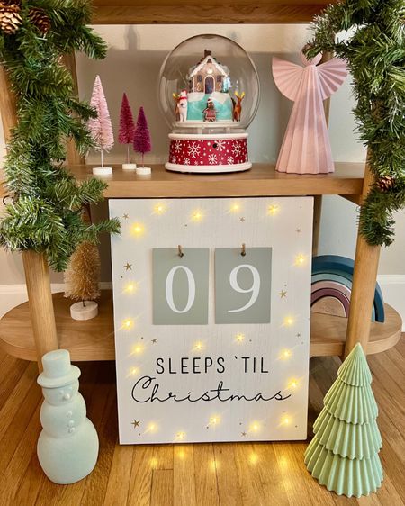 Nora’s Christmas bookshelf is always fun to style to the season. Many mini festive elements like the musical snow globe (her current obsession), tiny figurines, & Christmas countdown sign wjth twinkling lights make her room so festive! 

#bedroomdecor #kidsroom

#LTKkids #LTKHoliday #LTKfamily