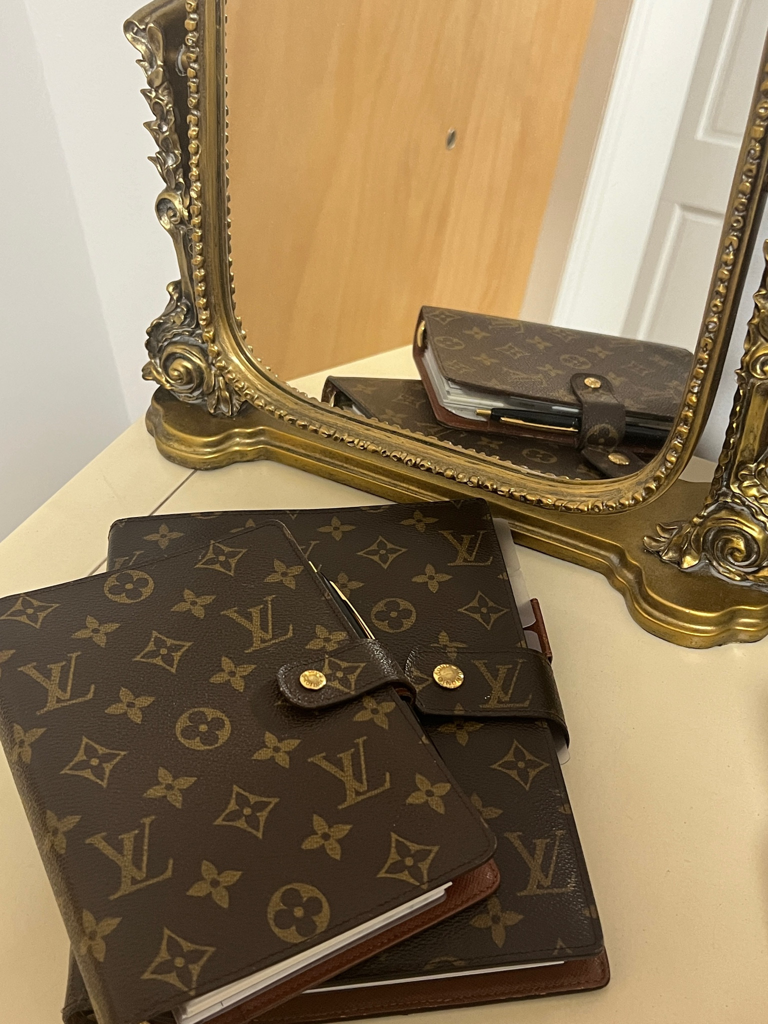 Anthropologie Primrose vanity mirror & louis vuitton agendas 

#LTKhome