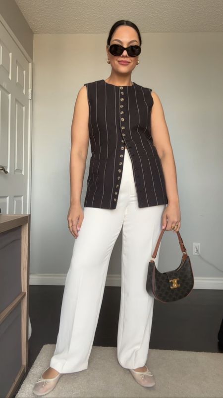 Spring outfit idea! Details below:

-White tailored pants from Aritzia, I have a size 10. 
-Dissh pinstripe vest. I have a medium. 
-Dolce Vita white mesh ballet flats. 
-Celine Triomphe sunglasses and Ava bag. 


#LTKstyletip #LTKcanada #LTKsummer