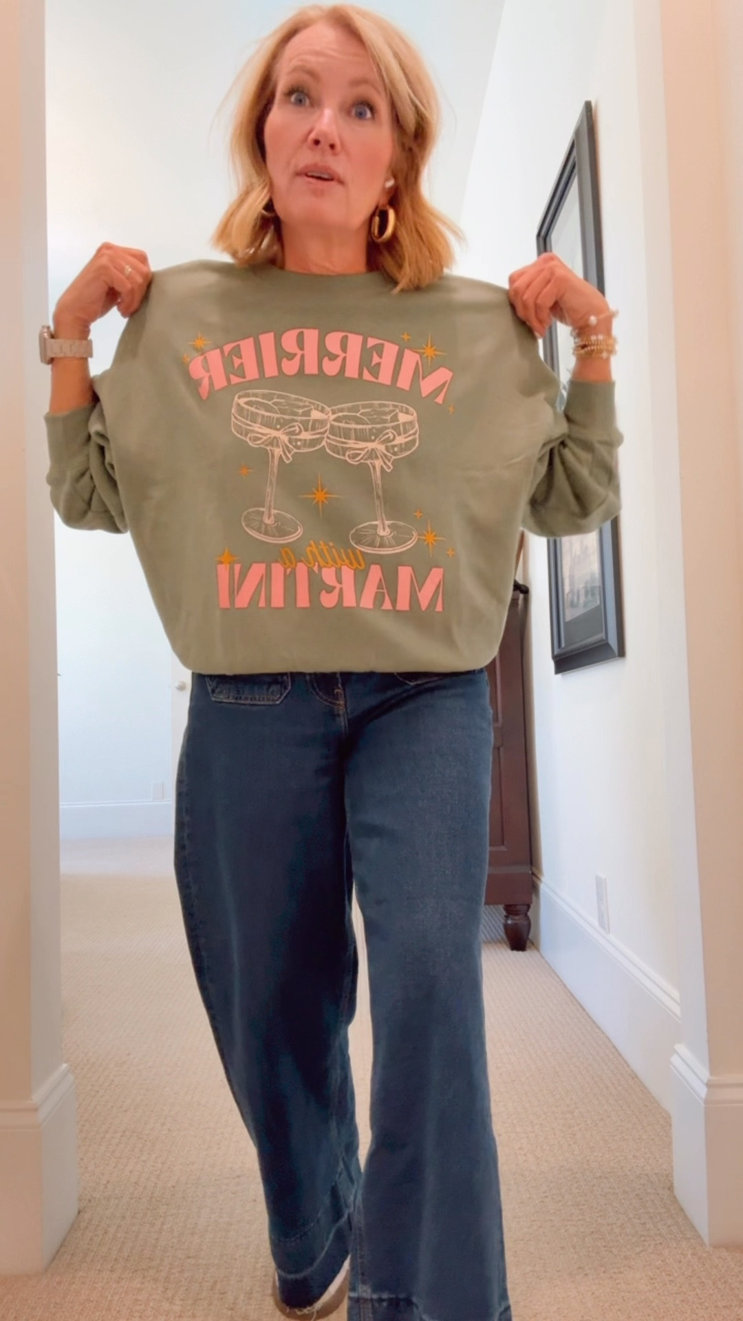 Maybe green is your holiday color?! This sweatshirt is so soft and cozy. This is a small so it’s a bit oversized but so cute! Merrier with a martini? I think so!!!🍸🎄

#LTKCyberWeek #LTKSaleAlert #LTKHoliday