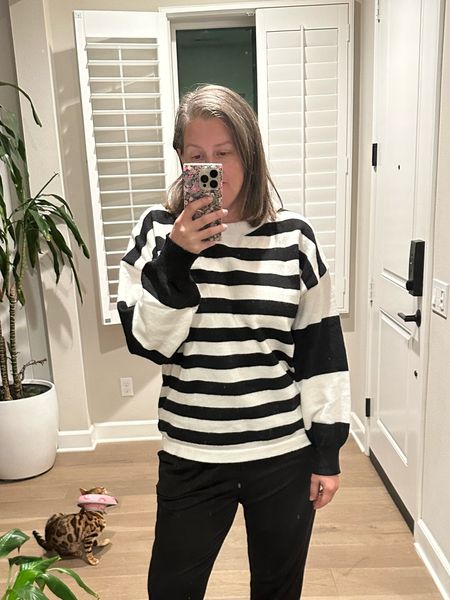 Wearing a medium in this striped black and white sweater. Great quality does run slightly oversized

#LTKMostLoved #LTKSeasonal #LTKover40
