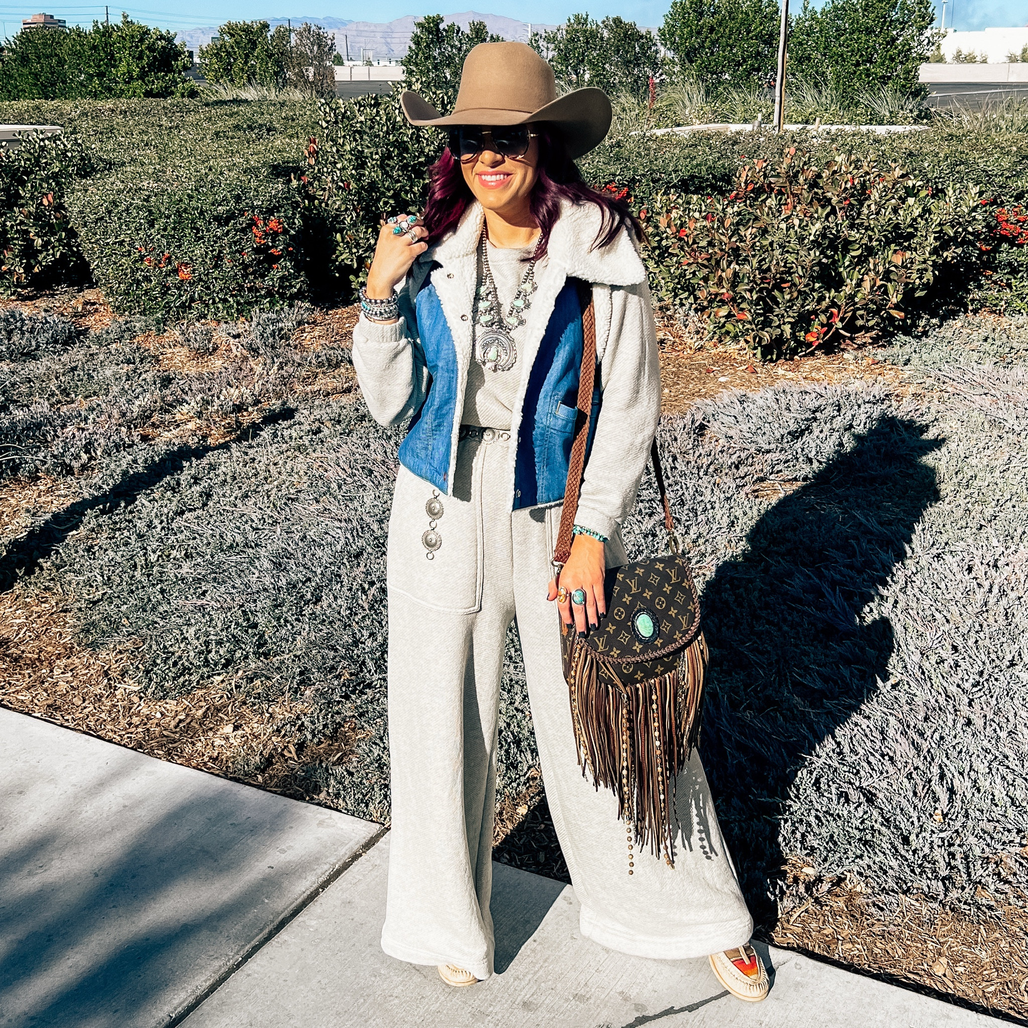 Sherpa vest wrangler - free people jumpsuit - cowgirl cowboy outfit NFR rodeo 

#LTKFindsUnder50 #LTKStyleTip #LTKWorkwear
