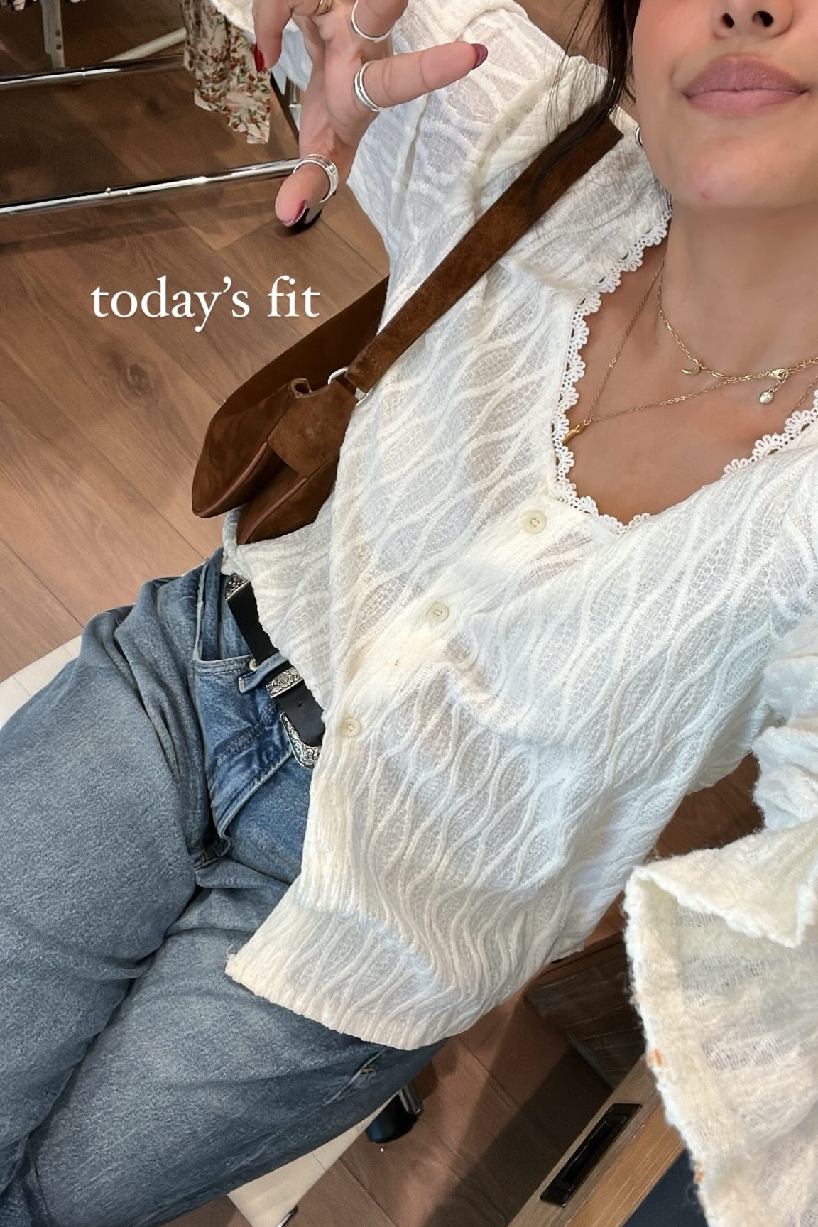 the cutest white lace top! I wore it by itself but you can also layer it!! Wearing a size large!