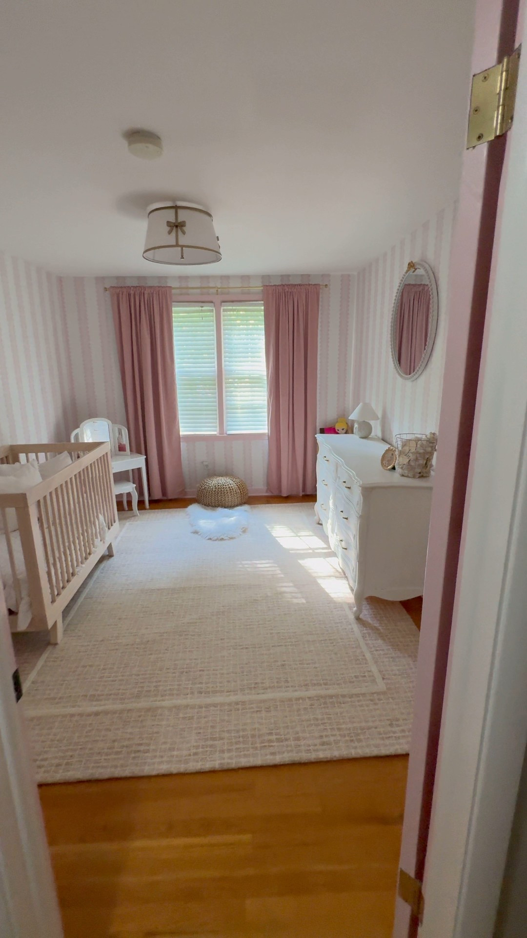 Rory girl’s nursery. 🎀 Wallpaper, bows, rug, curtains etc all linked! 

#LTKBaby #LTKHome #LTKKids