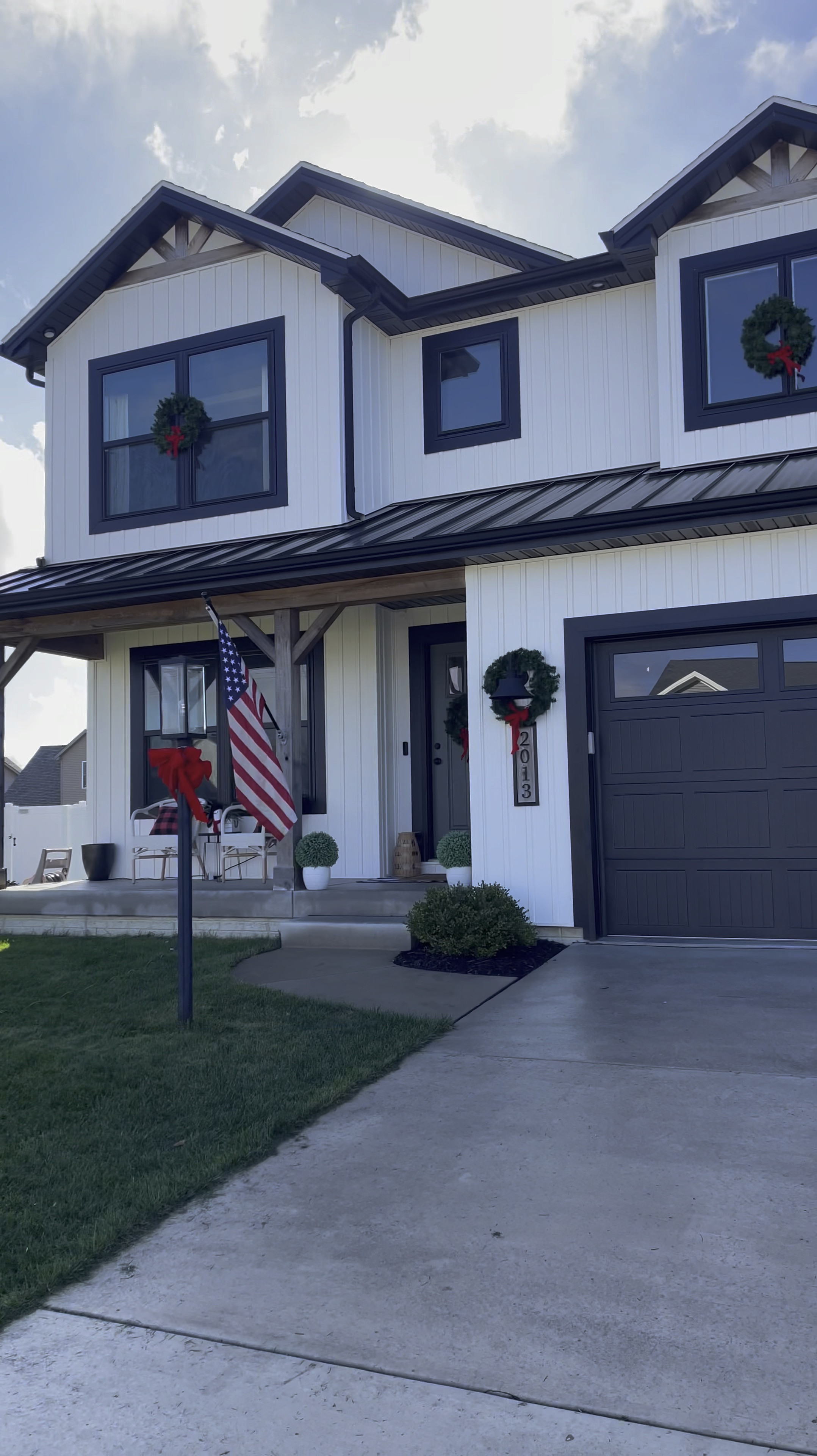 Canadian pine artificial Christmas wreaths. These wreaths look so good on each window of our house. I absolutely love them! We hung each wreath with a suction cup hanger and added a red bow. 

#LTKHoliday #LTKSeasonal