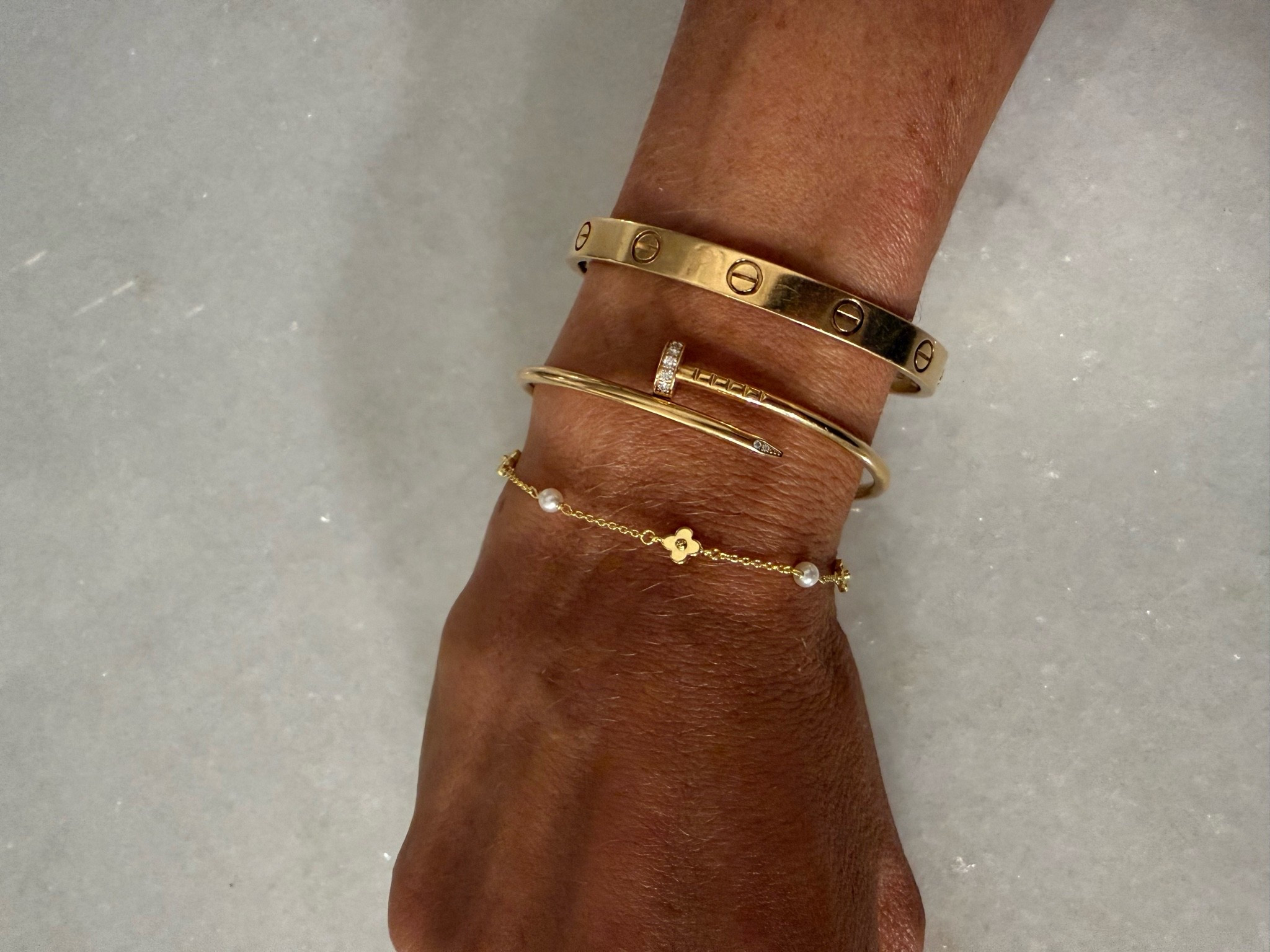 Gold flower bracelet stack that’s doesn’t tarnish

#LTKSaleAlert #LTKPetite #LTKgrwm