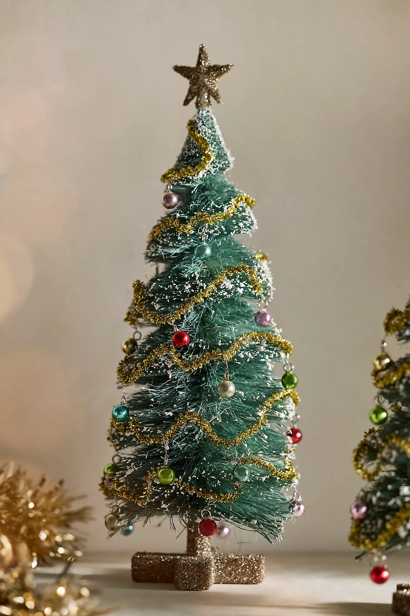 Flocked Garland Brush Tree | Anthropologie (US)