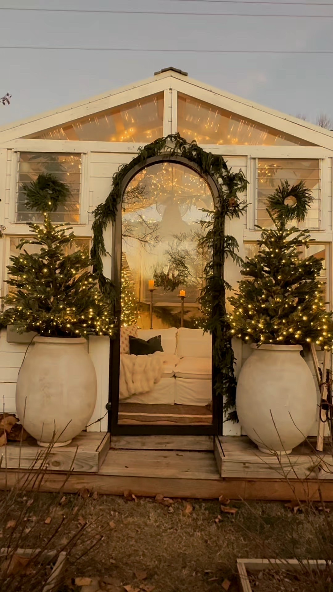 My greenhouse is turned into a Christmas wonderland for family photos! I just got this scalloped outdoor rug and it’s currently 30% off with code XMAS30 — my front 2 trees are from Balsam Hill and the couch is from chicory. The firepit used to be sold on Amazon and isn’t any longer. The candle stands I found on Facebook marketplace! I linked what all I could! The door was also a marketplace find  

#LTKSeasonal #LTKHome #LTKHoliday