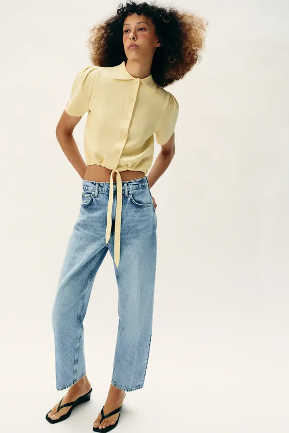 Cardigan with a lapel collar and short puff sleeves. Adjustable hem with a tie. Front button fast... | Zara UK