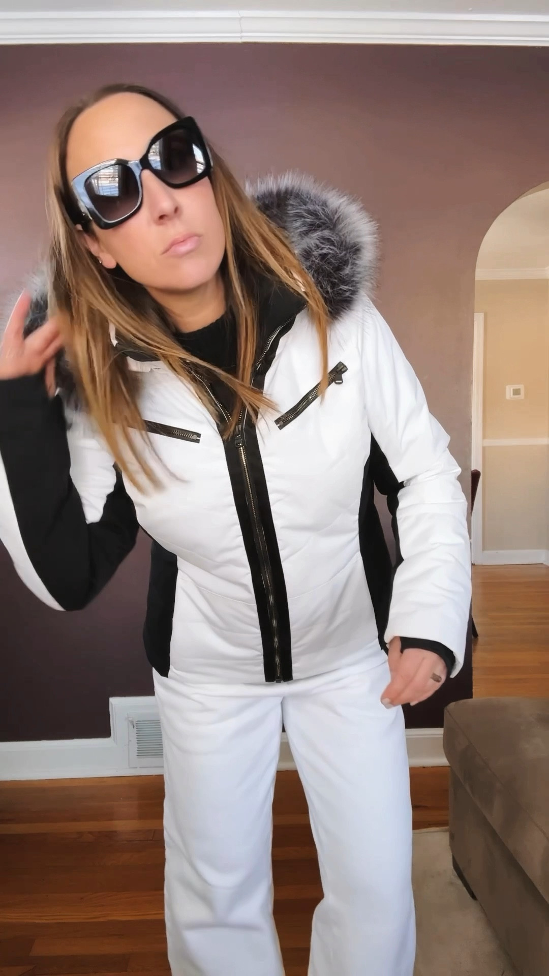 Winter apres ski look. It’s really just a great pair of white lounge pants and a black cashmere sweater. I kept the black and white theme going with my adidas sneakers, ski coat and my new sunglasses. Oh, and I can’t forget my new tote (on sale!). //. Winter outfit. Travel outfit. Ski outfit. Accessories. Coat. Faux fur. Tote bag  

#LTKSeasonal #LTKStyleTip #LTKWatchNow