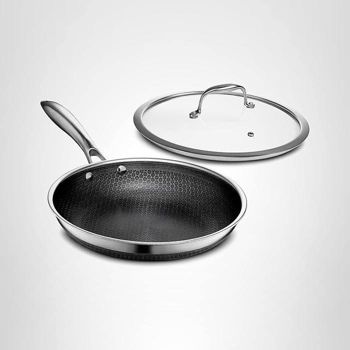 HexClad Hybrid Nonstick 10-Inch Frying Pan with Tempered Glass Lid, Stay-Cool Handle, Dishwasher-... | Amazon (US)