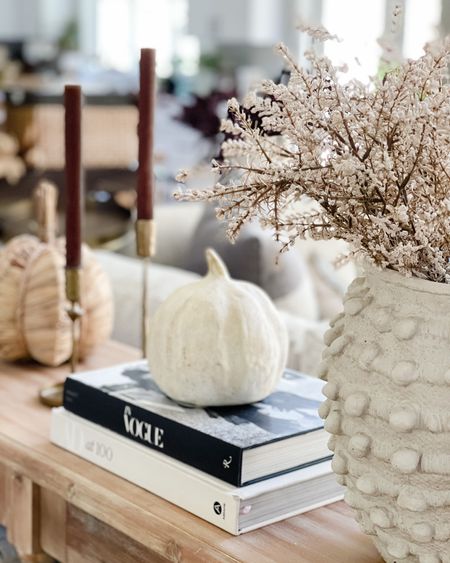Fall console table idea with candles, textured vase and pumpkins!

#LTKstyletip #LTKhome #LTKunder100