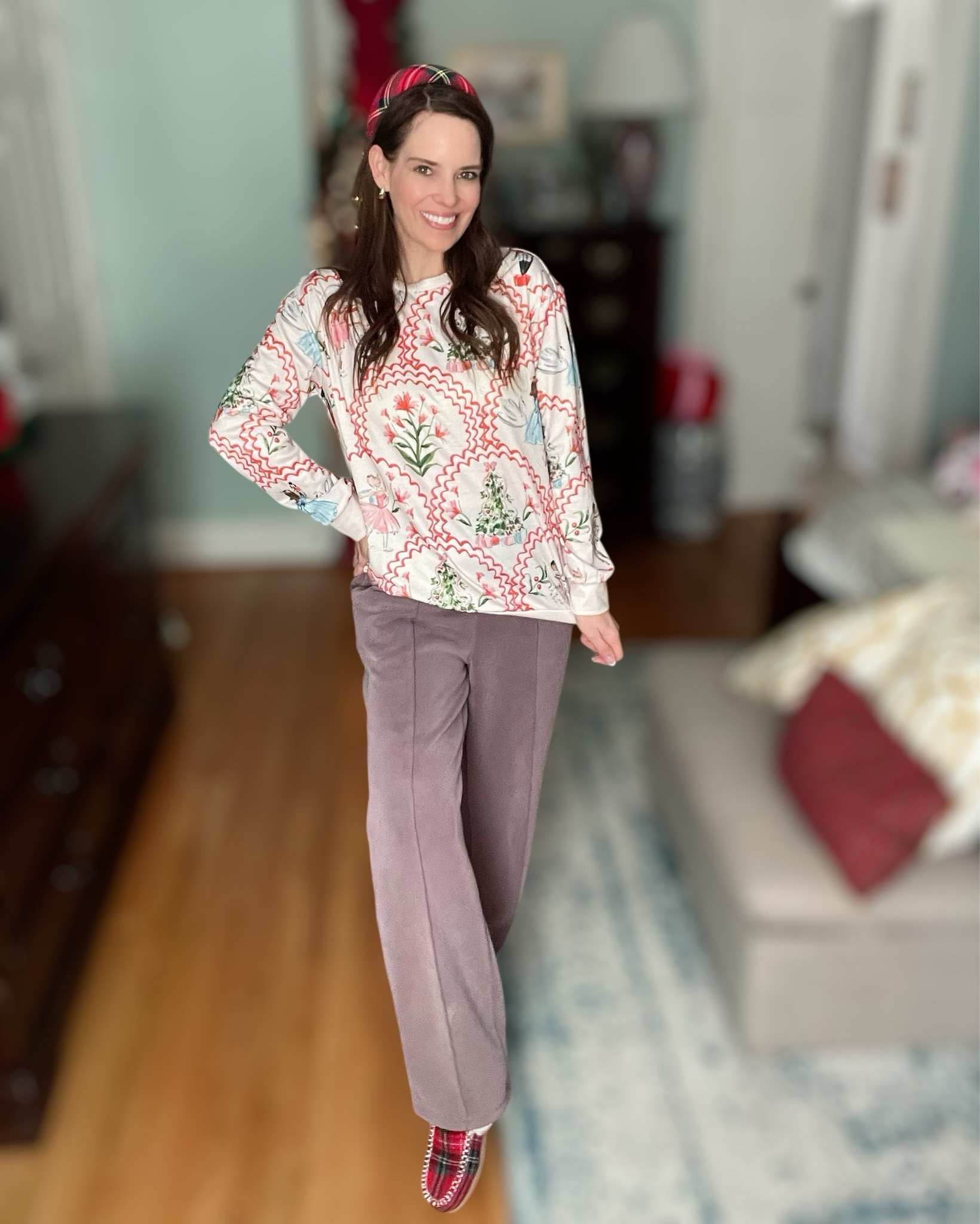 Nutcracker Cozy Christmas Look 🎄🩰✨

The sweetest Nutcracker print sweatshirt — whimsical, festive, and perfect for cozy holiday days at home. I paired it with my favorite soft wide-leg Amazon pants for the comfiest fit and added a tartan padded headband to tie in the Christmas colors. The plaid Dearfoams slippers finish the look with that cute holiday-at-home vibe. This outfit is peak December cozy — comfy enough for wrapping gifts, baking cookies, or watching The Nutcracker with the kids. ❤️🎁

nutcracker sweatshirt • christmas loungewear • cozy holiday outfit • festive pajamas look • wide leg amazon pants • tartan headband • plaid slippers • comfy christmas style • holiday morning outfit • casual december outfit • christmas inspo • winter lounge set • soft neutral pants • holiday prints

#LTKHoliday #LTKFindsUnder100 #LTKFindsUnder50