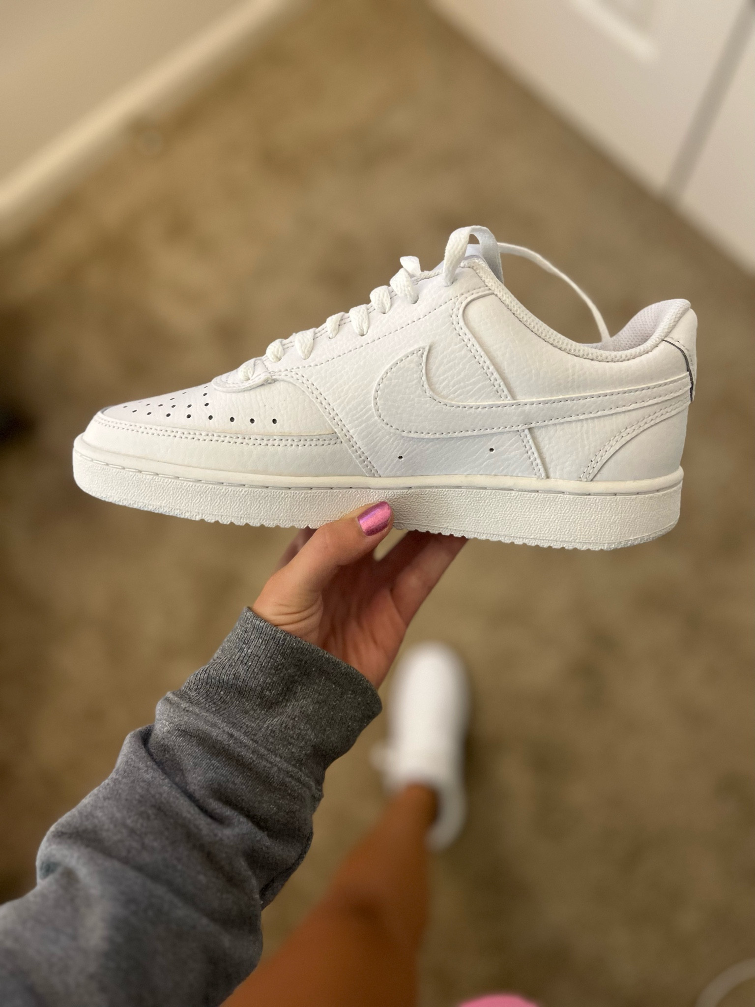 White Nike Court Vision Low 

#LTKshoecrush #LTKSeasonal #LTKstyletip