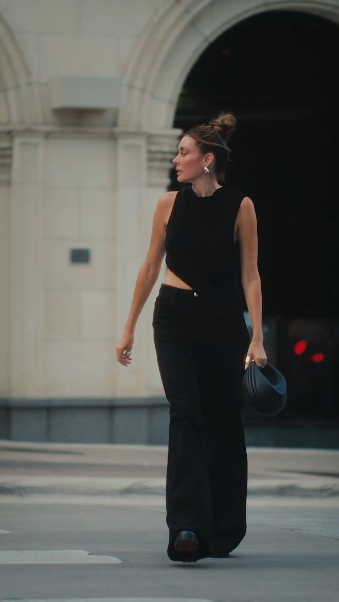 Modern black. Asymmetrical details with gorgeous draping sets this top apart. Paired with my favorite wide leg denim that is extra long for us long legged or tall girls.  Paired with standout and versatile accessories.  

#LTKStyleTip #LTKOver40 #LTKSummerEdit