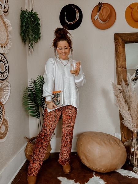 Boho cozy church Sunday casual outfit inspo! 

Pants are thrifted but linked similar yoga pants / printed flare leggings. Oversized sweater wearing medium for slouchy fit. Platform clog heels runs TTS. Cross earrings and my boho butterfly Bible 

#LTKstyletip #LTKU