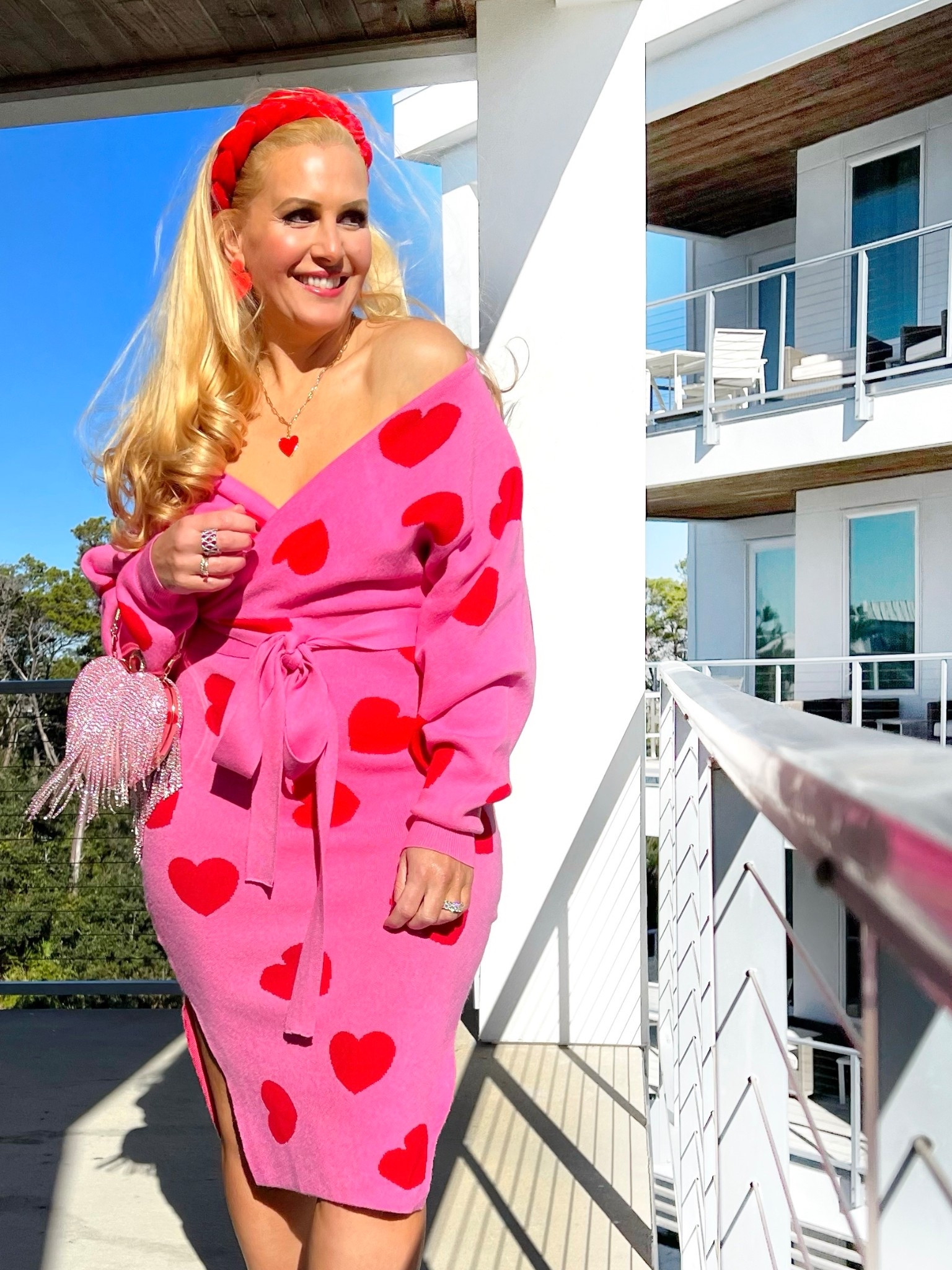 Could this Valentine’s Day sweater dress under $50 be any cuter? Obsessed! You can wear it so it covers your shoulders or pull it down so it’s off the shoulders, like I did.

I’m wearing a medium and fits true to size. Also check out my rhinestone heart clutch.

#LTKSeasonal #LTKFindsUnder100 #LTKOver40 #LTKWedding #LTKSaleAlert #LTKFindsUnder50 #LTKU #LTKMidsize #LTKTravel #LTKgrwm #LTKootd #LTKWorkwear