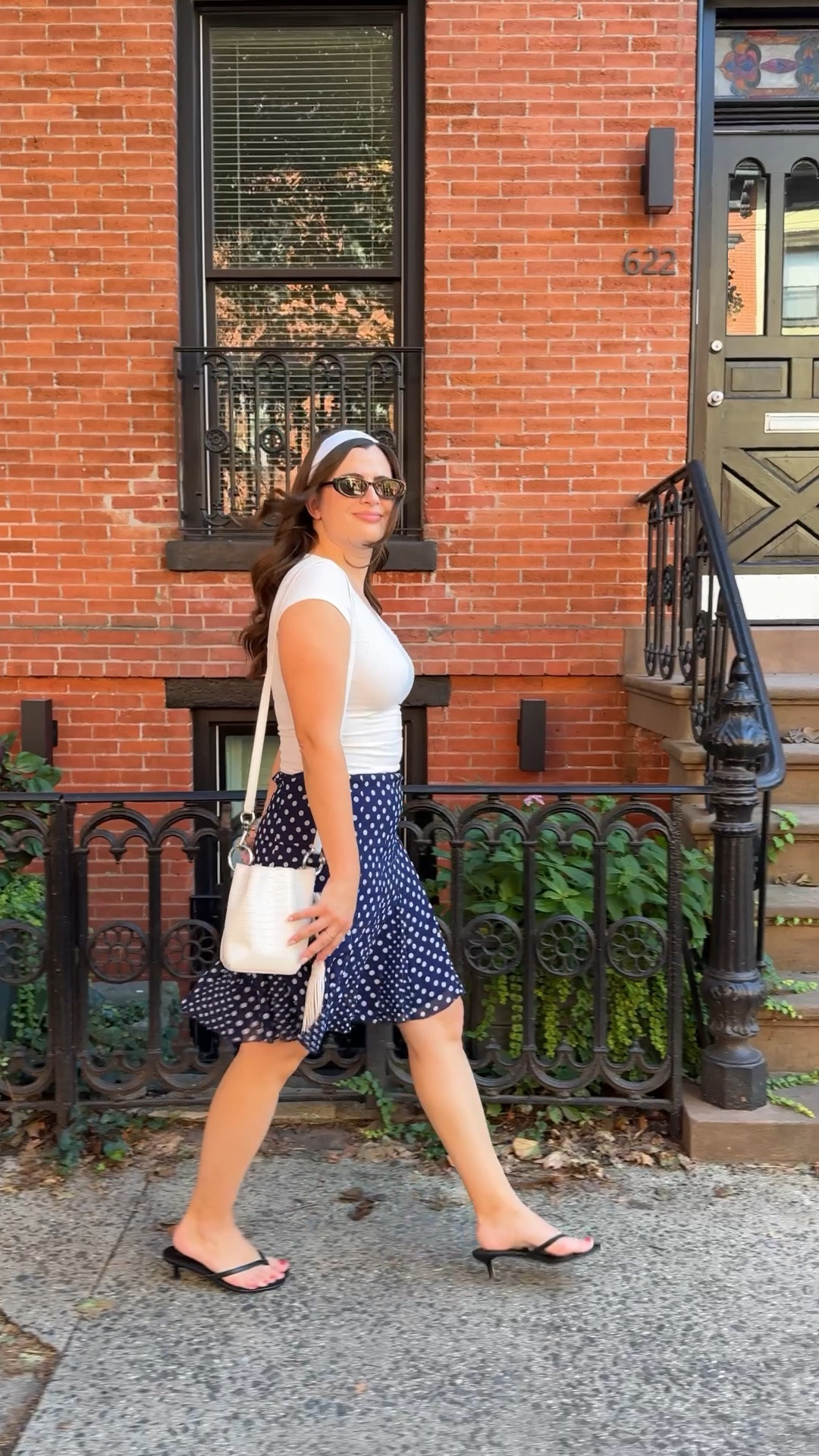 One final summer outfit! The midi skirt with polka dots is so cute and I paired it with a simple white t-shirt and some flip flop heels.

#LTKootd