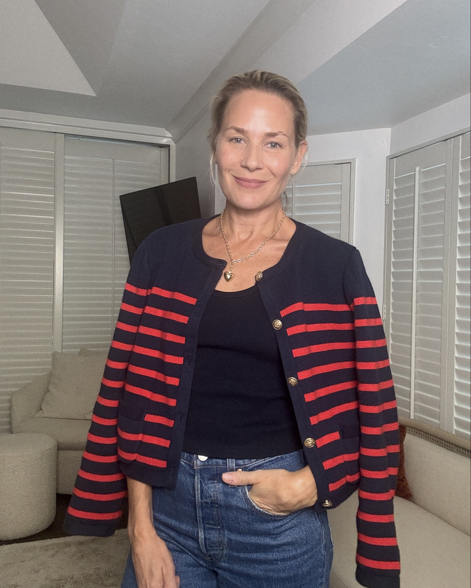 Great jeans, tank top and striped knit outfit idea. This is my go to look when I’m in a hurry! 

Favorite tank at the moment is the Blondie from Perfect White Tee. Jeans are high waisted and cropped with slightly wider leg, Rib Cage Flare by Levi’s and Cardi is the striped ‘lady’ jacket from J Crew. There are so many great colors available now, some are very Chanel inspired, but of course I went for the stripes! Trainers are Comme des Garçons Play x Converse. I have these in white lo and black hi. 

#LTKOver40 #LTKFindsUnder100 #LTKStyleTip