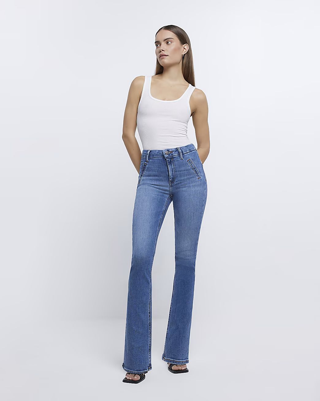 Blue high waisted flared bootcut jeans | River Island (UK & IE)