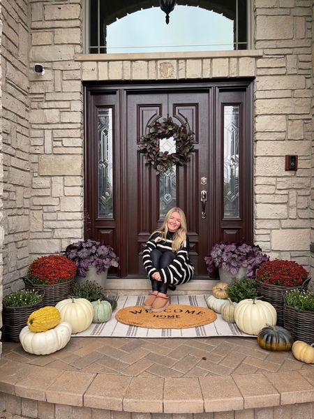 FALL FRONT PORCH — Just styled our front porch for fall! I l used a mix of faux and real pumpkins here. All the flowers are real but you can also do faux. 

Fall outfit, fall decor, front porch, fall decorating, faux pumpkins, pumpkins, mums, fall flowers, fall, fall outfits, 

#LTKSeasonal #LTKhome #LTKmidsize
