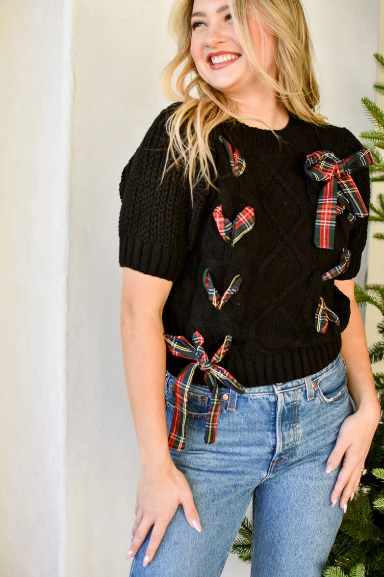 All Wrapped Up Black Cableknit Sweater with Plaid Ribbon | Confête