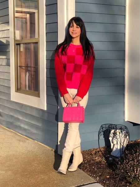 Can’t decide between pink or red for a Valentine’s look? Why not wear both in this adorable checked heart embroidered sweater! So soft and comfy!
