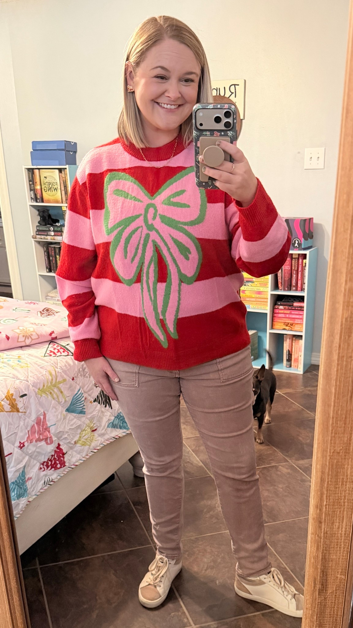 Bold stripes, bright colors, and the cutest giant bow 🎀✨ Festive but make it fun! 

#LTKHoliday #LTKMidsize #LTKootd