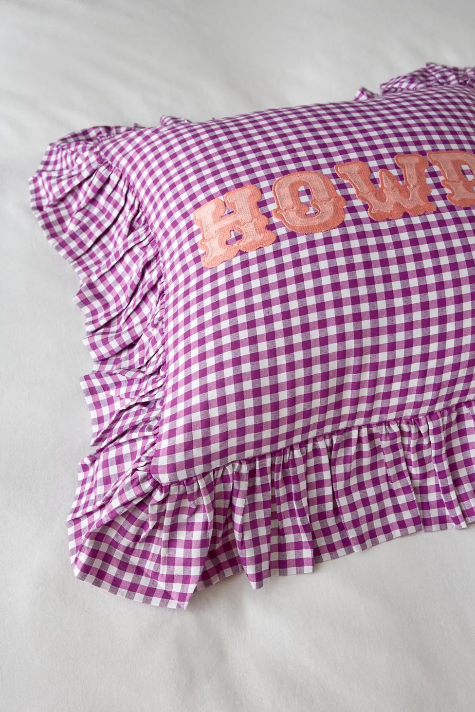 Gingham Howdy Slogan Text Ruffle Throw Pillow | Urban Outfitters (US and RoW)