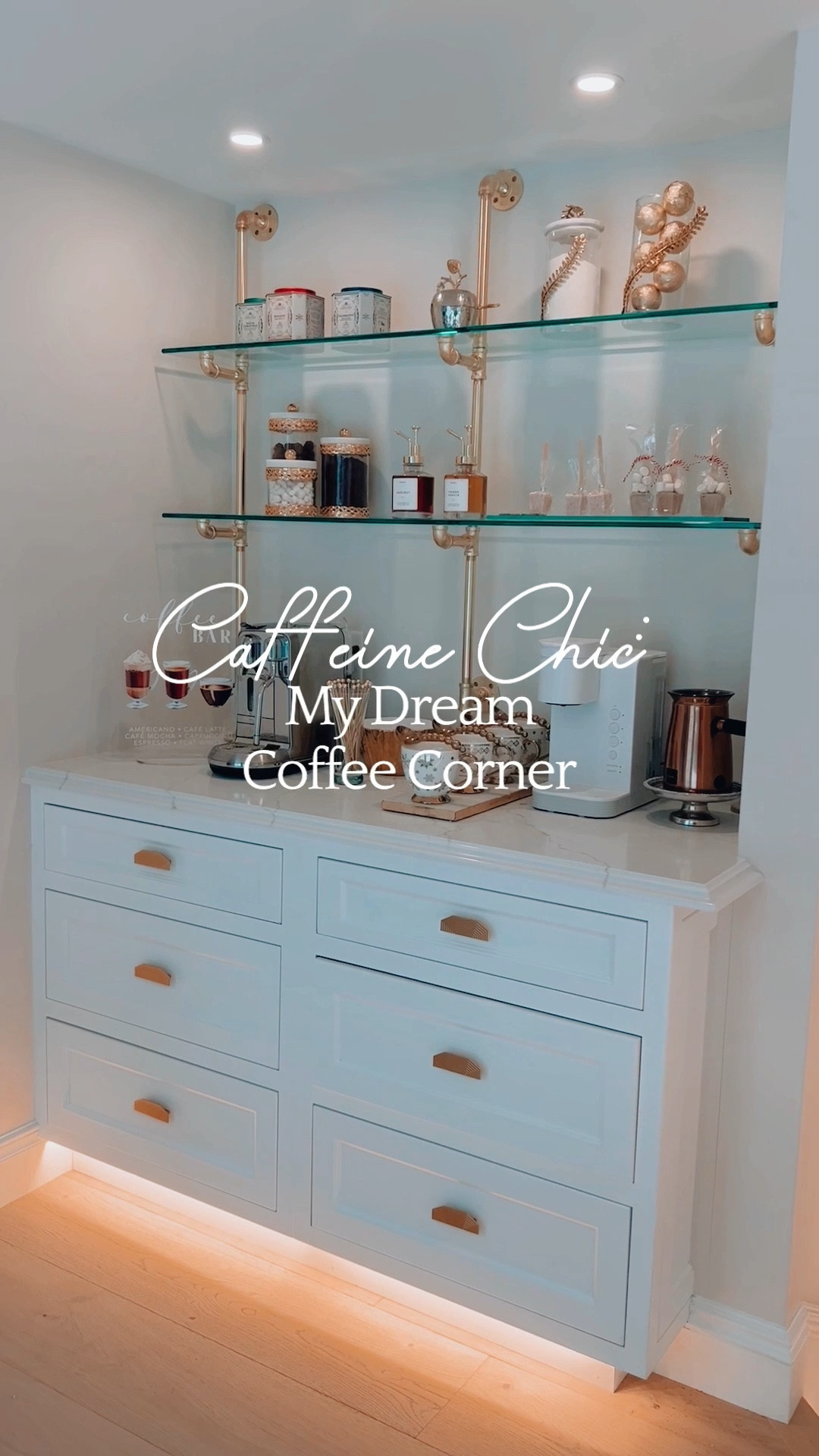 Hello, my fabulous friends! Just so you know, while NobleWoods was getting its stylish facelift, I was hopping between rentals and luxe hotel rooms. This nomadic lifestyle had me missing the warm embrace of my previous coffee corner. But now, it's been reimagined and is shining brighter than ever in my newly adorned home!

This corner is a little piece of my journey, a blend of past comforts and present elegance. The glass and brass shelves? They're a dazzling feature, echoing the opulence of my kitchen island and butler's pantry, bringing a slice of that hotel luxury into my daily life.

And let's talk about the delights on these shelves! It's a haven for coffee lovers, tea enthusiasts, and hot chocolate fans alike. We're talking about chic chocolate bags from a British chocolatier, chocolate bombs overflowing with marshmallows, and all the essentials: lush coffee syrups, chocolate spoons that are pure bliss, and the most divine chocolate shortbread cookies. And yes, plenty of marshmallows – because why not indulge a bit more?

#LTKfamily