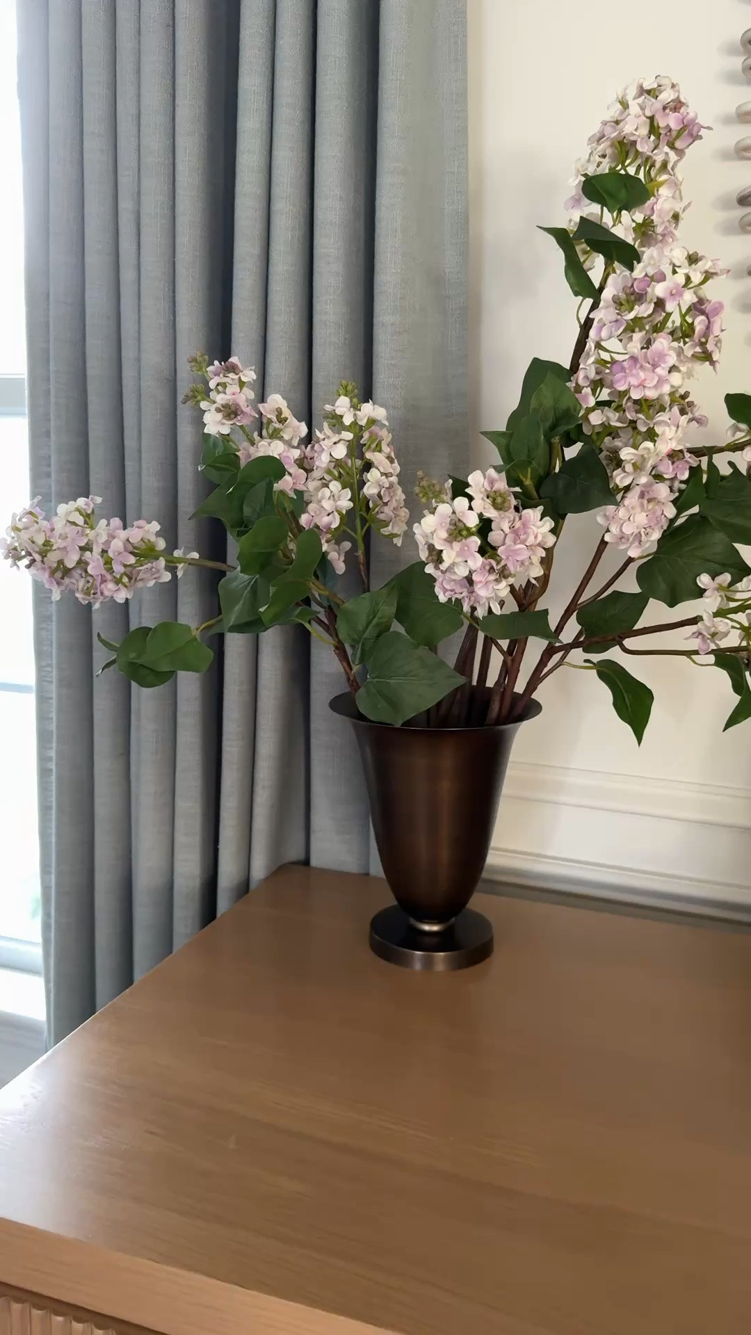 The best faux lilacs I’ve found and I’ll be using this vase to style seasonal greenery all year long long (it’s going to be gorgeous for fall branches and winter pine needles!)

#LTKSeasonal #LTKvlog #LTKHome
