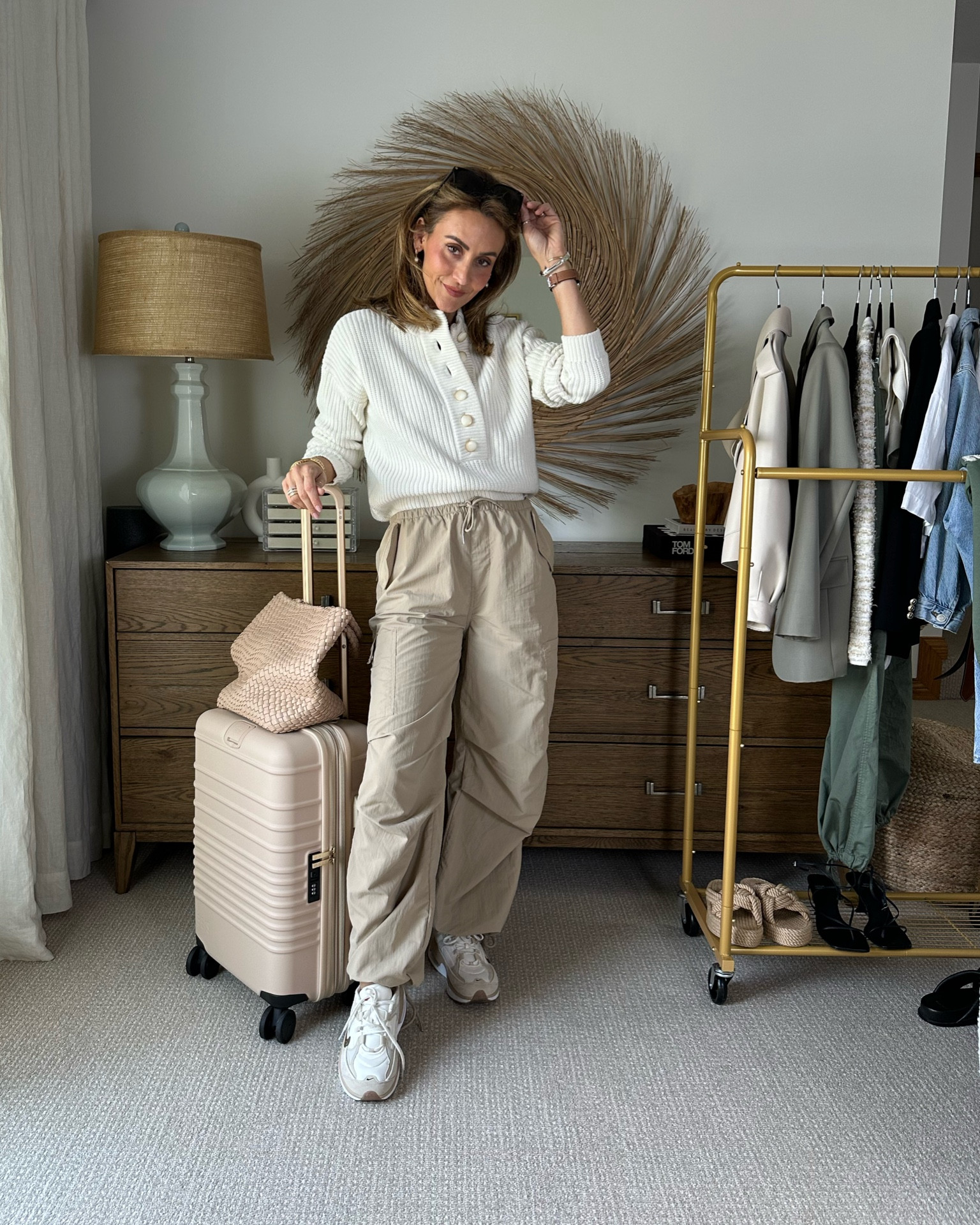 H&M cargo parachute pants fits oversized 
Styled w my favorite all year Sezane sweater - travel outfit 
Chunky adidas sneakers are my comfiest sneakers all them all and definitely great for lots of walking! Beis suitcase has been a hit! 

#LTKtravel #LTKshoecrush #LTKstyletip
