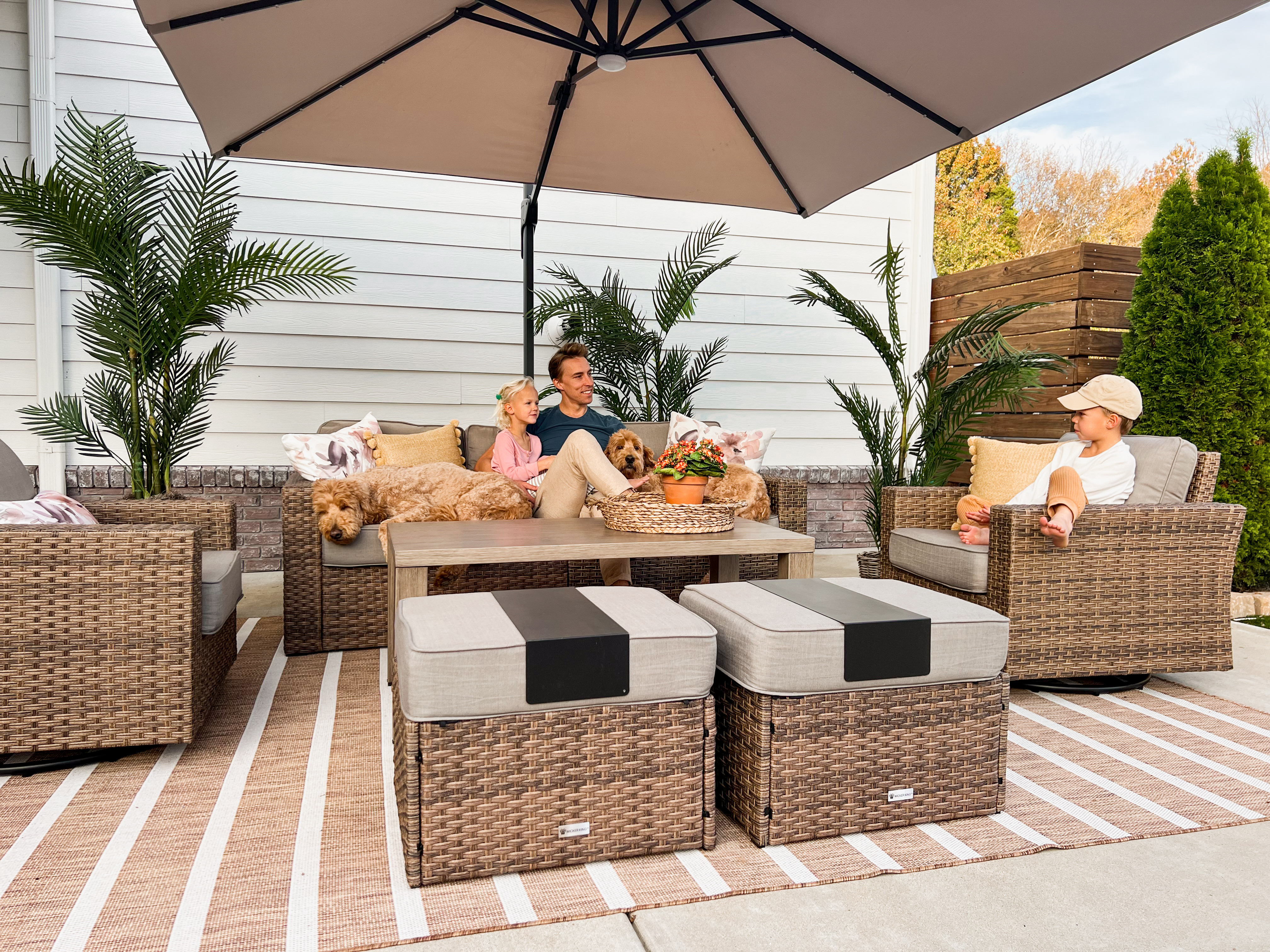 This budget friendly 6 piece patio furniture set with sofa, two swivel rocking chairs, coffee table and two ottomans with storage is a great Amazon find! I love the warmth of the brown wicker me the cushions are comfortable and water resistant! Looks great with our new cantilever umbrella and outdoor rug! 

#LTKStyleTip #LTKHome #LTKSeasonal