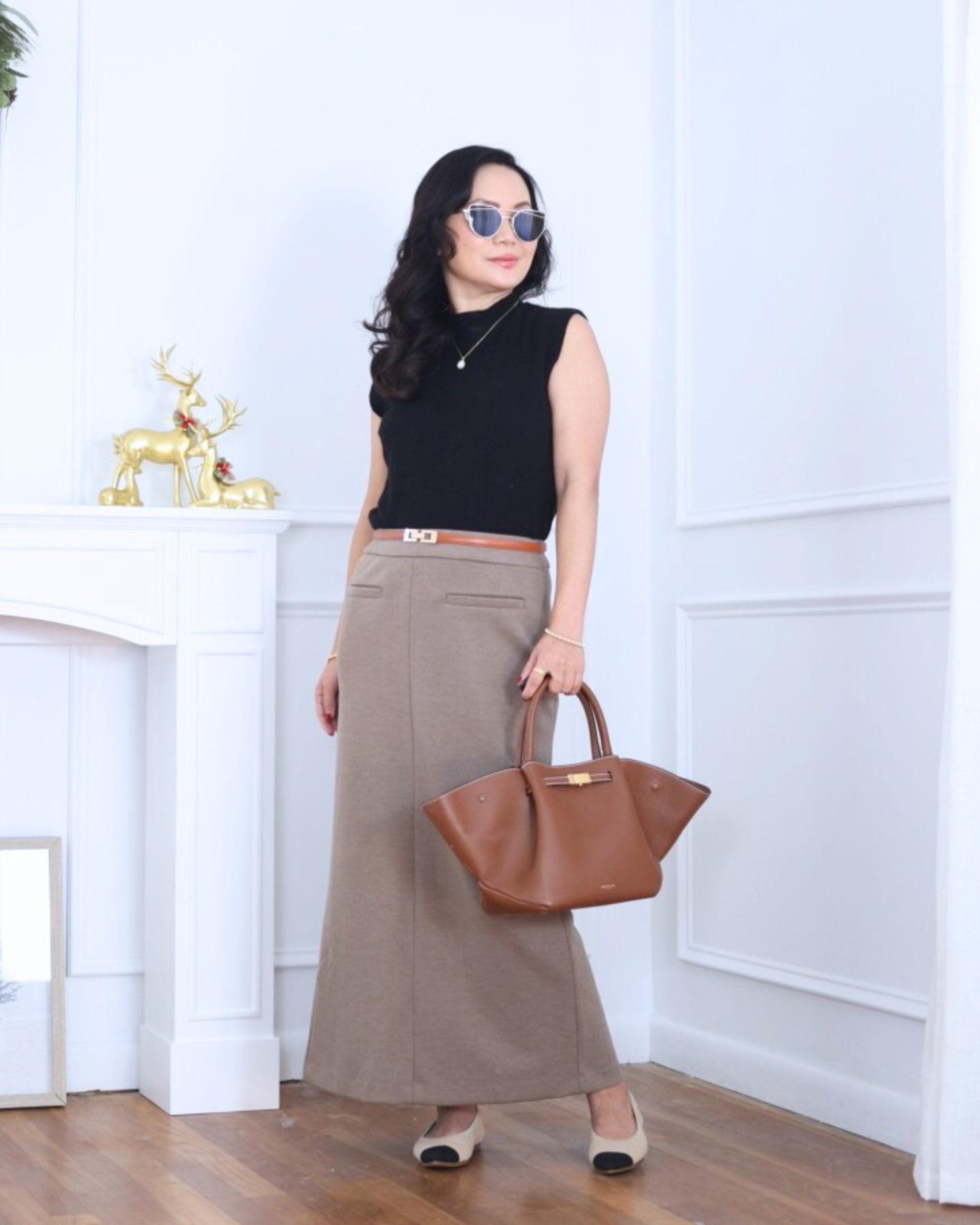 Sleek and understated — this Quince sweater vest paired with a maxi pencil skirt from Mango feels modern, polished, and effortlessly chic. Perfect for days when you want to look put-together without overthinking it. I’m 5’2, wearing size XS.

#LTKPetite #LTKOver40 #LTKootd