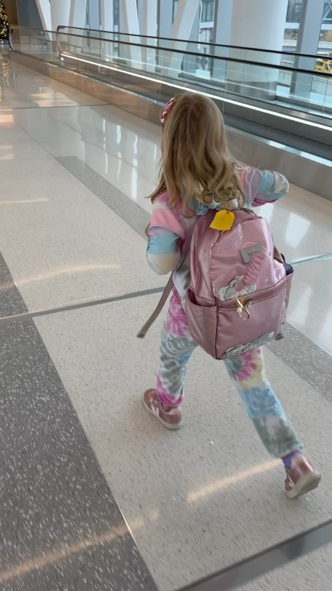 Happy girl ready for the plane ✈️

#LTKTravel #LTKGiftGuide #LTKKids